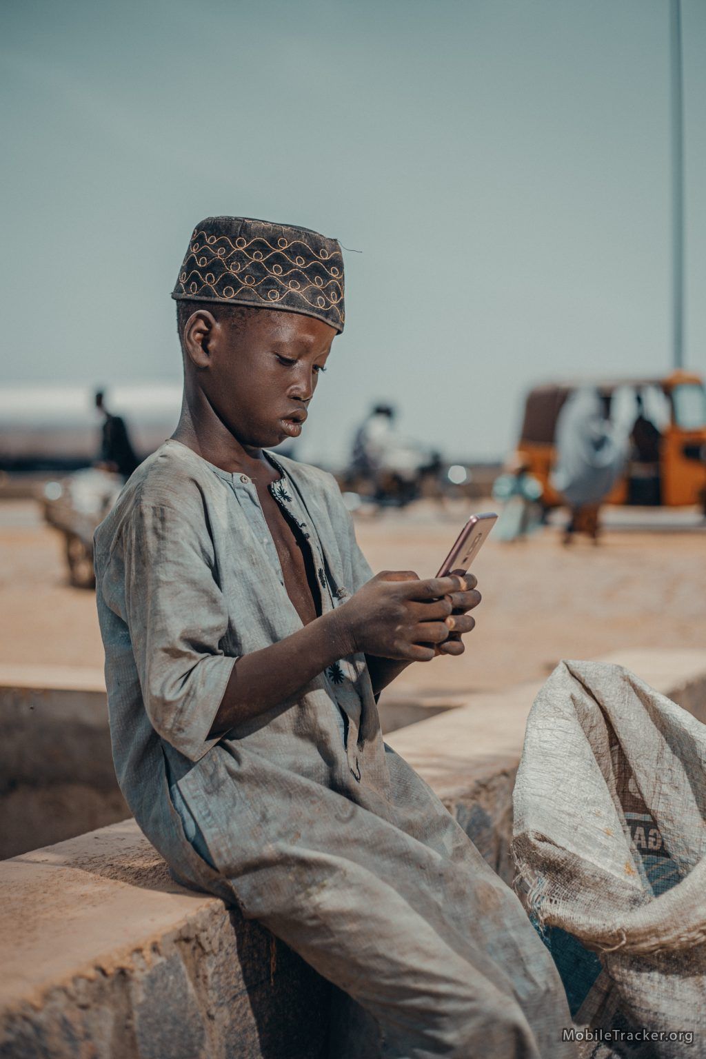 boy holding a phone