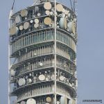 cellular tower with dozens of microwave antennas